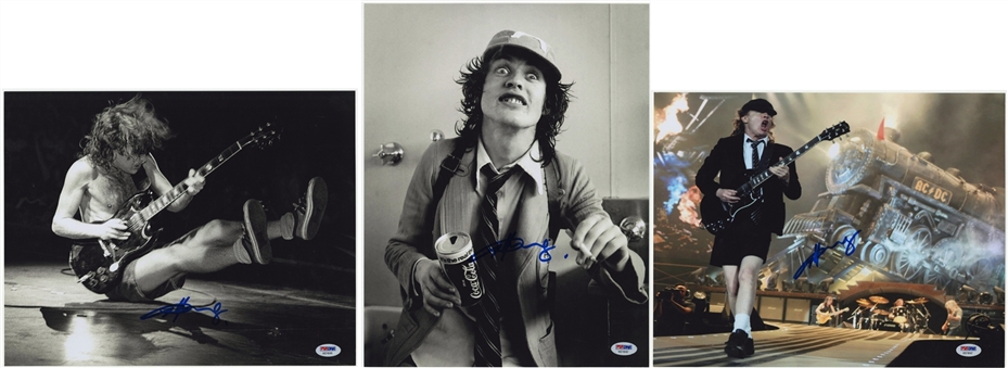 Lot of (3) Angus Young Signed 11x14 Photos (PSA/DNA)